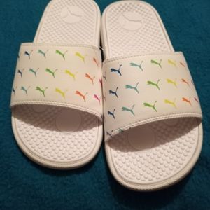 Multicolored Puma slides